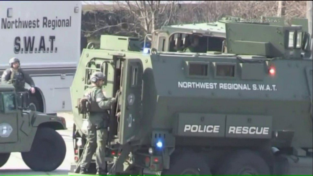 One man was taken into custody after police raided a home in northwest Indiana. Police, SWAT teams and the Secret Service were at a home on the 3700 block of Liverpool Road in Hobart, Ind., Wednesday afternoon. Cameras spotted the officers removing weapons and other items.