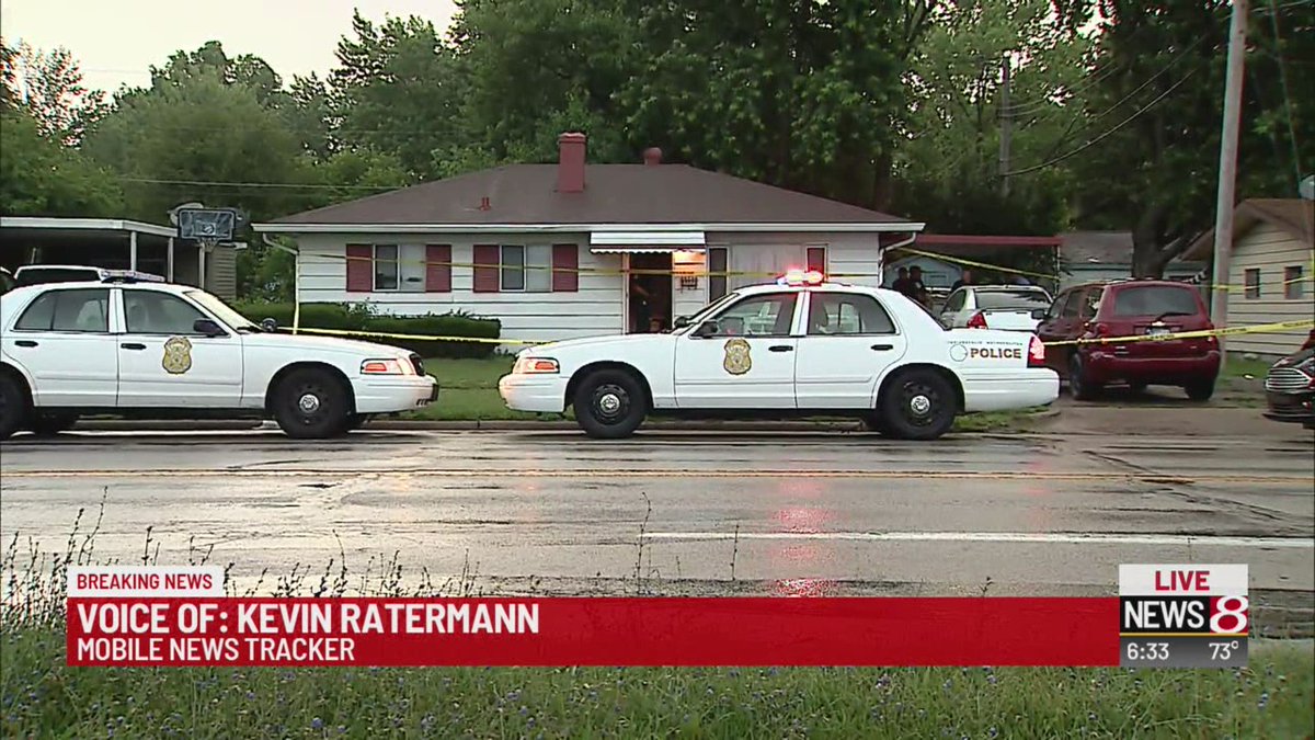 Police say a woman was driving  SUV around a Westside Indianapolis neighborhood, hit two people and tried to run off