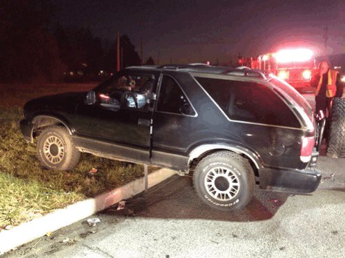 Plainfield PD tells a woman wasn't seriously injured when she was found unresponsive behind the wheel of this SUV on Main St, just west of County Line Rd. 1 WB lane is blocked.