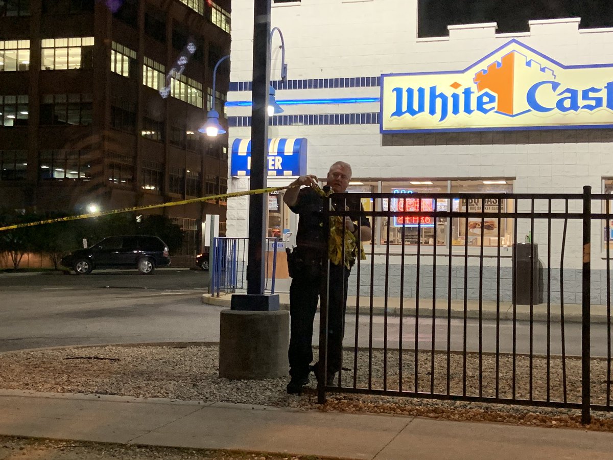 IMPD Crime Lab is removing tape at the shooting scene were 2 people were shot at this White Castle overnight   