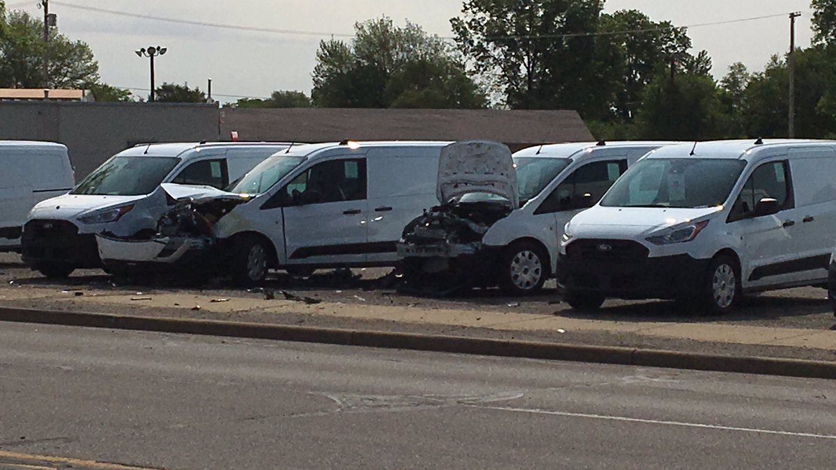 Cedar is blocked between Marian and Jefferson in Mishawaka after a car crash. It appears a vehicle crashed into at least two vans on the lot at Jordan commercial fleet.