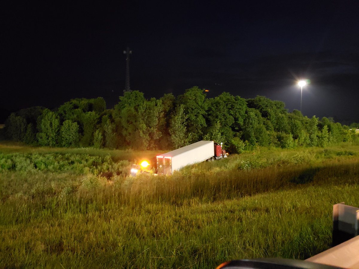 The ramp of NB I-465 is closed near I-865 due to a crash. A semi is completely off the roadway and down a ravine.   