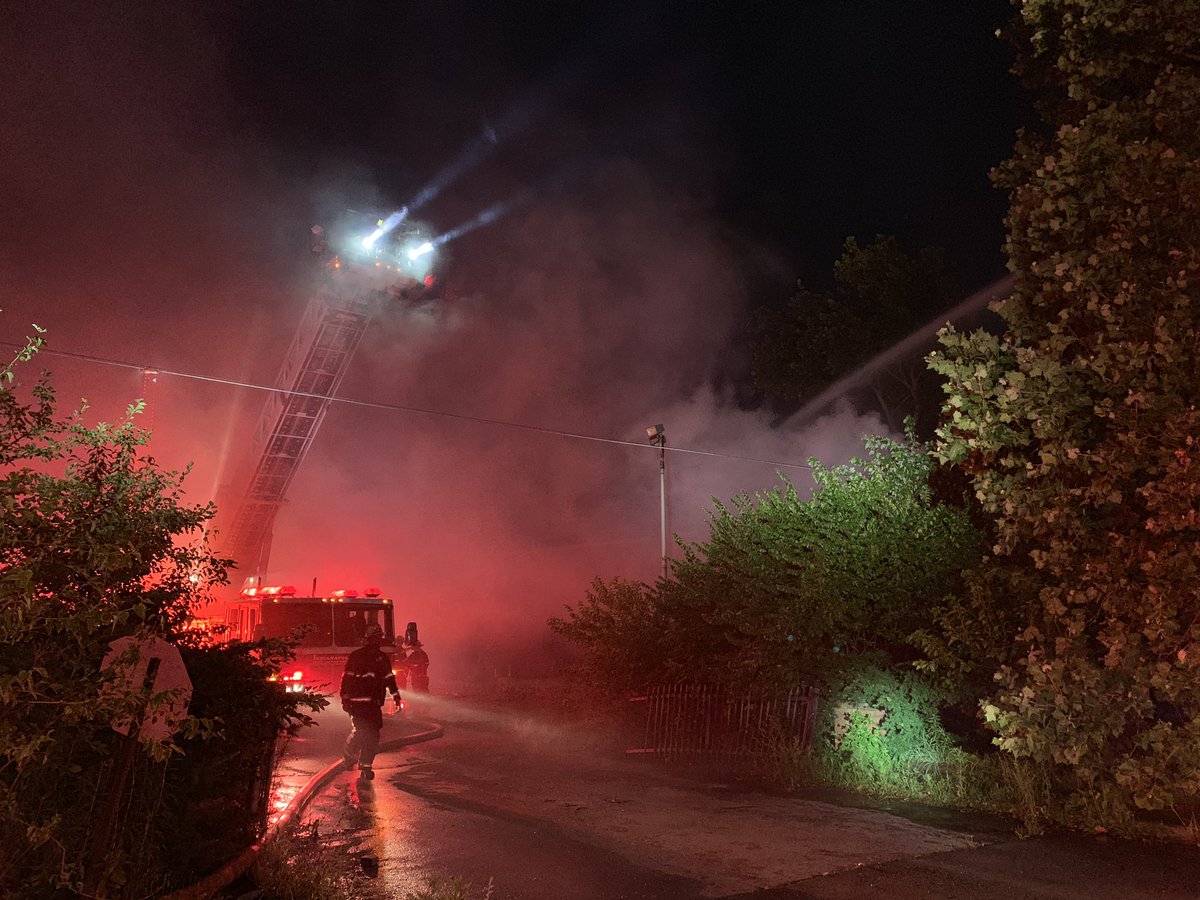 Apartment complex formerly known as Oaktree Apartments is vacant and no firefighters have been hurt.