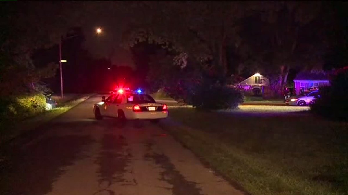 Three people are in custody after Lawrence officers say they fired shots at them during a chase early Monday morning