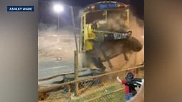 Driver loses control, crashes through fence during Zombie School Bus races 