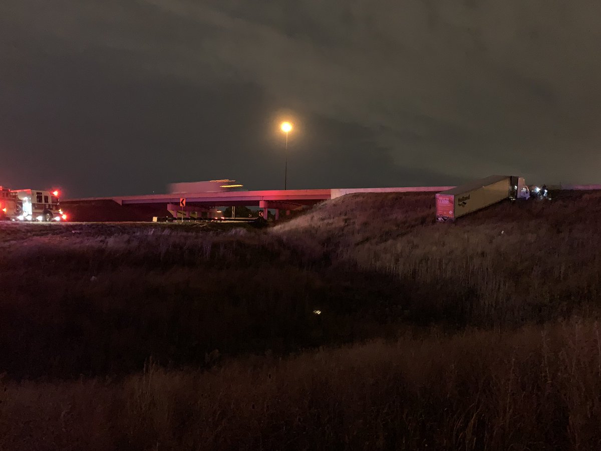 State Police investigating a semi that drove off the ramp of the north split to I-65 North into an embankment that leads to I-70 East. Driver being treated by medics now.