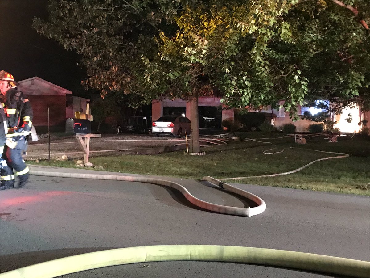 Firefighters on scene of a house fire in Carmel on E 101st st.   Everyone made it out safely no word on the cause of the fire yet. A lot of the damage is in the garage