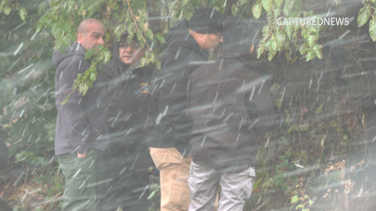 Gary Police along with the Lake County Coroner investigate a body that was discovered in a vacant lot