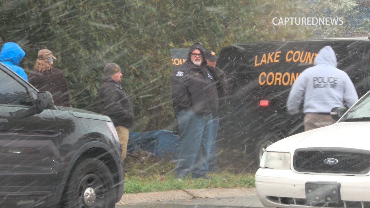 Gary Police along with the Lake County Coroner investigate a body that was discovered in a vacant lot