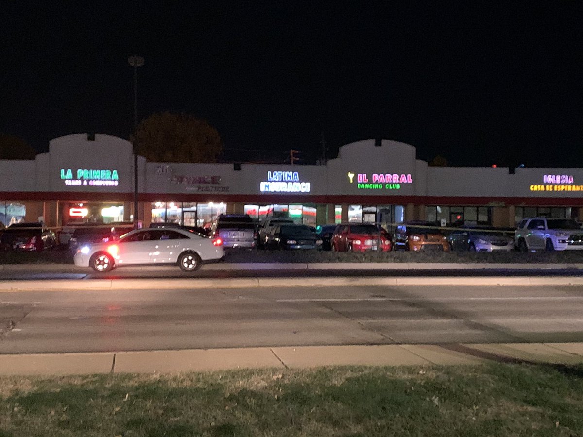 Police still on the scene where an off duty officer shot an armed robbery suspect who critically injured victim.
