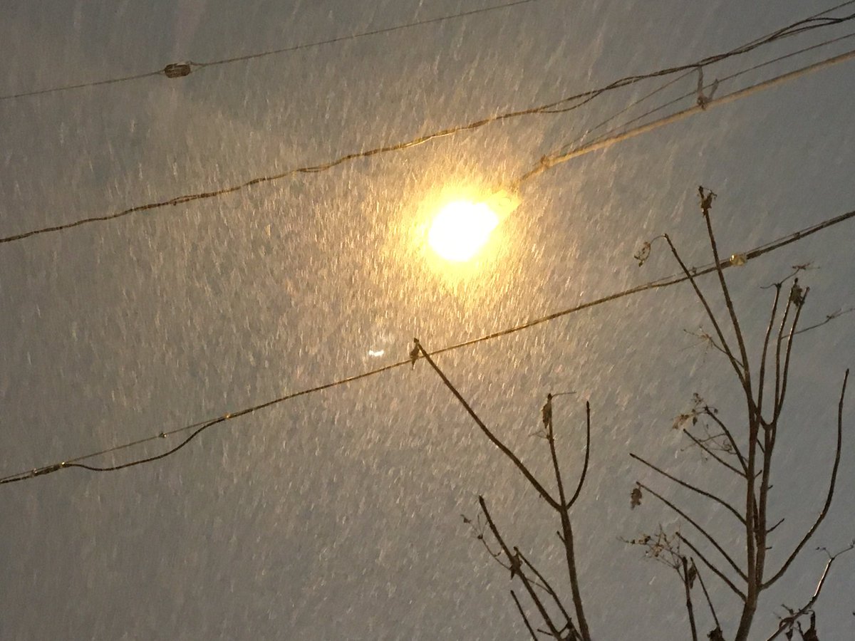 Snow is coming down in Elkhart along SR19. Roads are slippery because it's cold and there's still a lot of snow on the roads