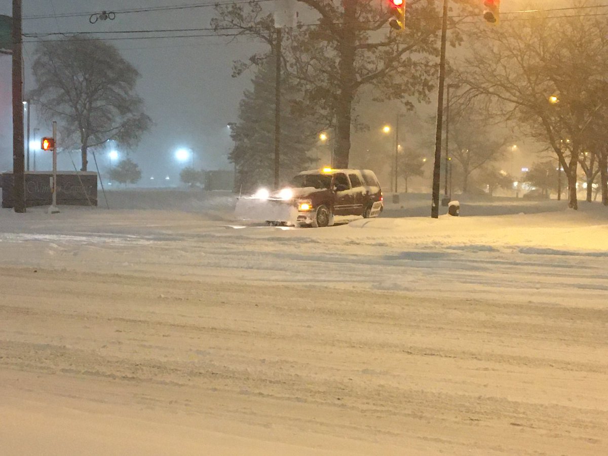 Snow is coming down in Elkhart along SR19. Roads are slippery because it's cold and there's still a lot of snow on the roads
