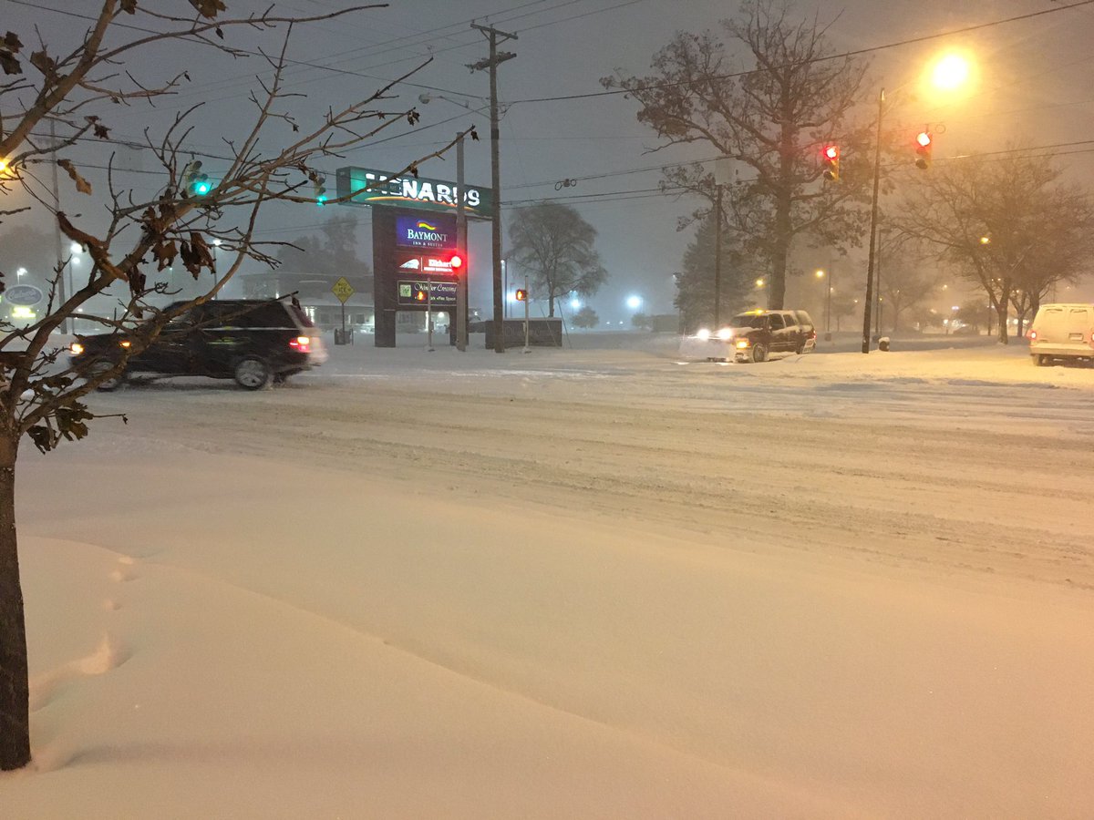 Snow is coming down in Elkhart along SR19. Roads are slippery because it's cold and there's still a lot of snow on the roads