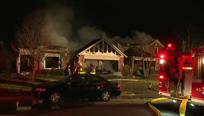 3 houses reportedly damaged after a fire near 30th & Cumberland. @CBS4Indy photojournalist says 2 of them look to be a total loss.