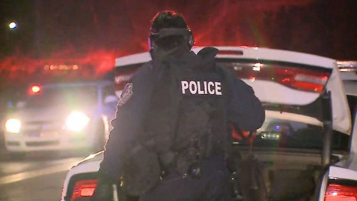 More than a dozen armed officers swarmed the cul-de-sac where a man barricaded himself inside a home near 79th and Township Line Road.