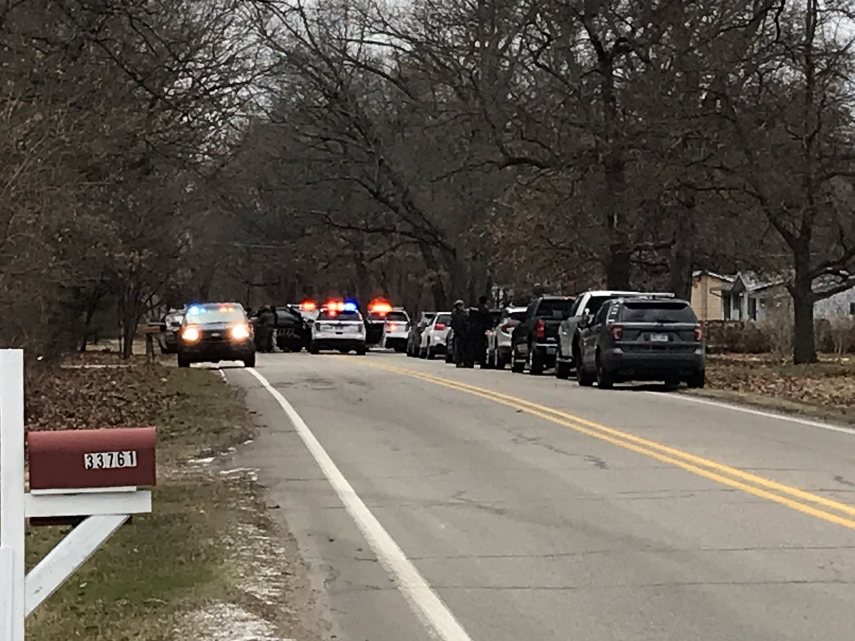 More than a dozen officers are on the scene at a home off of Redfield Street in Niles. 