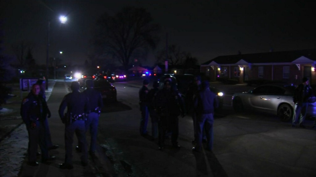 Two police officers were injured and a suspect was killed in a police-involved shooting in Gary that police say is linked to a homicide investigation in nearby Merrillville.