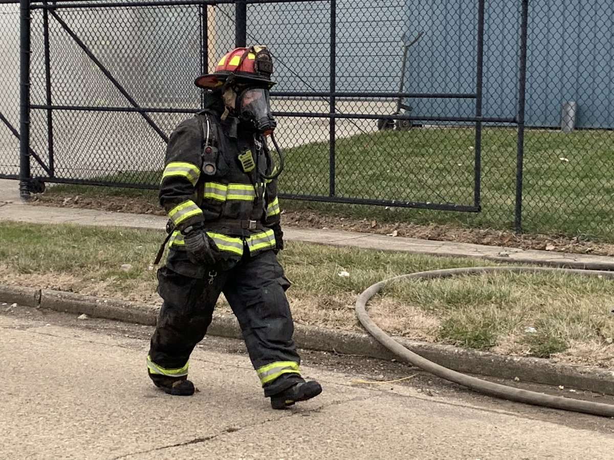 Firefighters use handline to cool outside of barrel containing epoxy as Haz Mat crews work with Major Tool personnel to mitigate chemical reaction.  12 students from nearby Zion Church preschool being relocated to IMPD site at 42nd & College.  No injuries