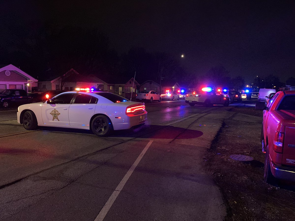 IMPD on scene of homicide on Indy's west side. Officers were responding to a shots fired call near Rockville & Holt, found a male with gunshot wounds in the woods behind neighborhood. He was transported to the hospital, later pronounced dead