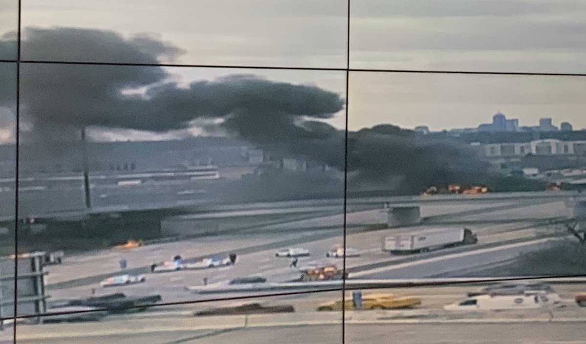 Tanker truck carrying fuel overturns and bursts into flames resulting in massive fire and clouds of black smoke on I-465 and I-70 on the east side near a ramp area.  Avoid the area. Emergency crews in scene 