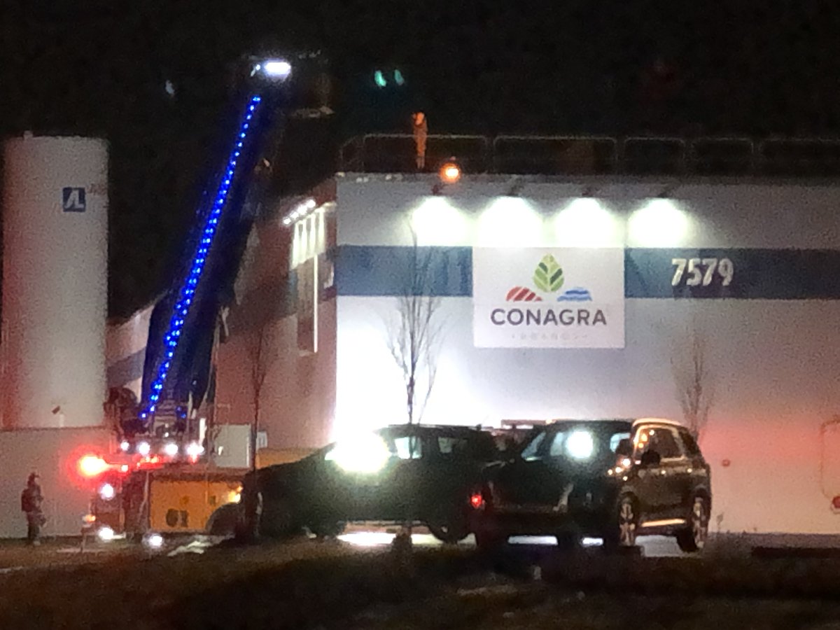 This is the scene on Georgetown Rd near 79th (NW side of Indy). No word yet on what's happened, but workers have been evacuated from the building, and firefighters are going up to the roof.