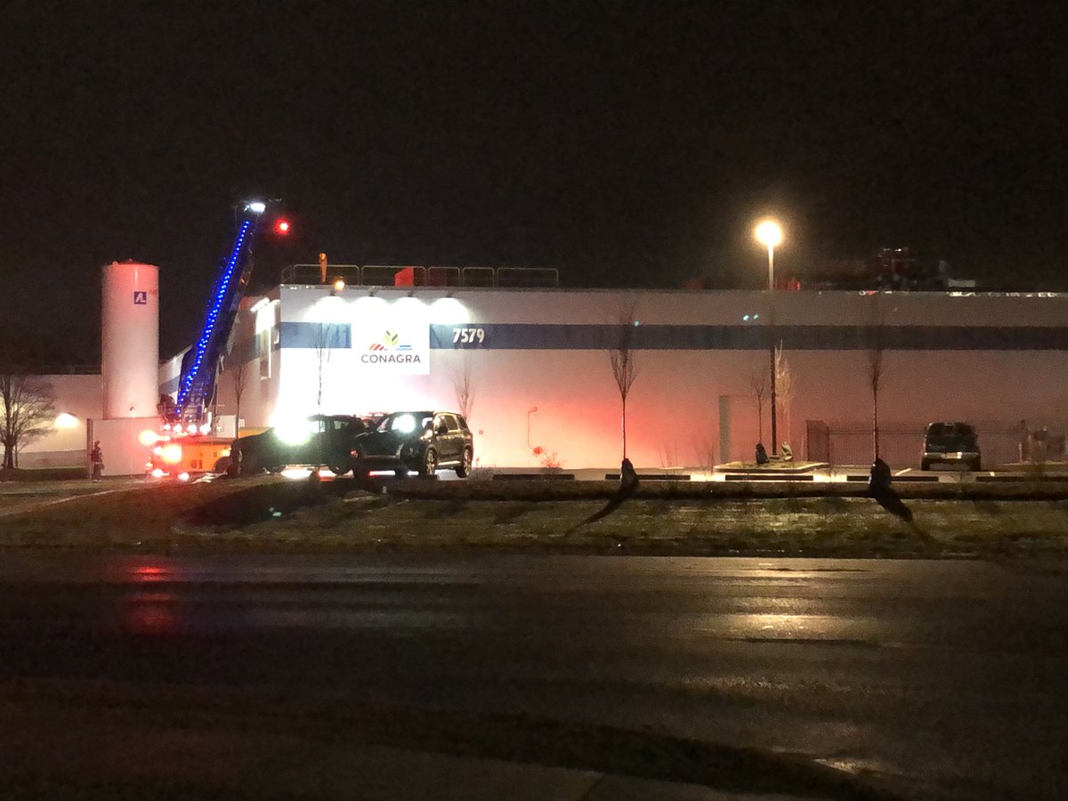 This is the scene on Georgetown Rd near 79th (NW side of Indy). No word yet on what's happened, but workers have been evacuated from the building, and firefighters are going up to the roof.