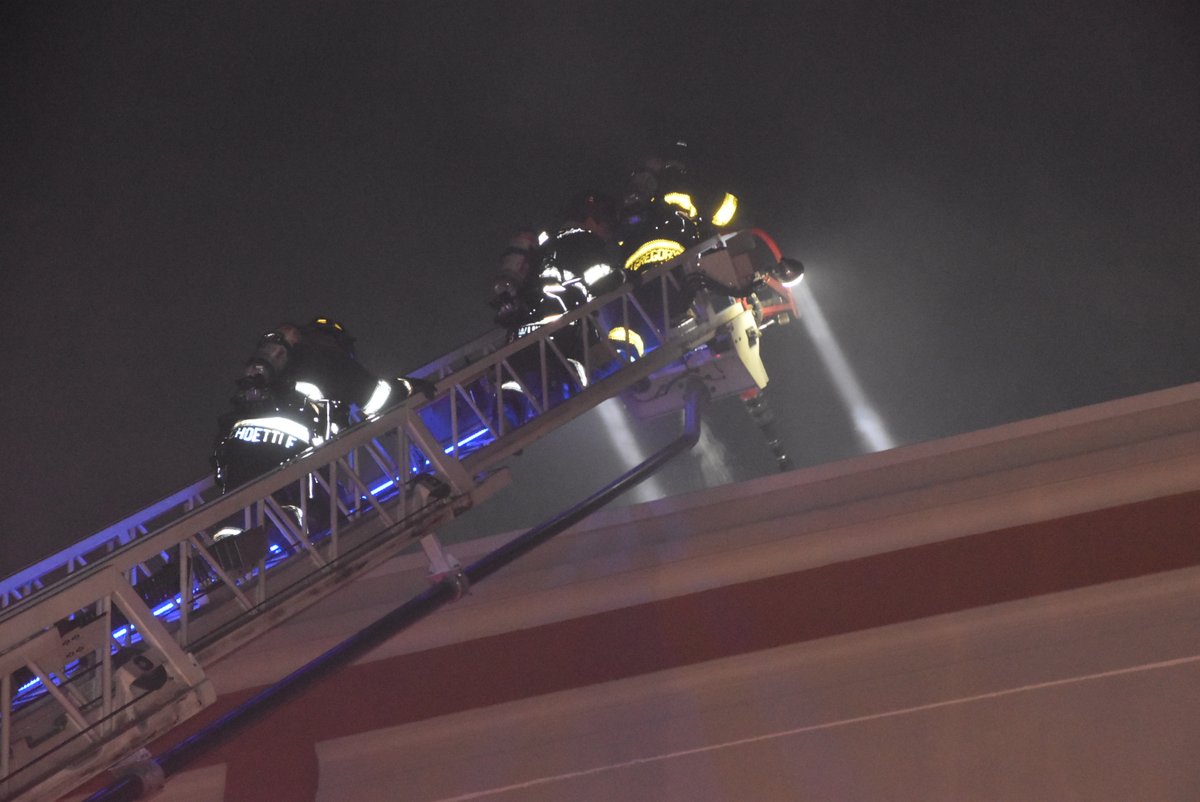 Over 100 evacuate after heavy fire breaks out on top of 800 Cap apartment building at 800 N Capitol Ave.  Blaze contained to 60 x 40 composite wood deck with  no extension.  Firefighters mark under control in 40 minutes with  use of aerial ladders & high rise packs for attack