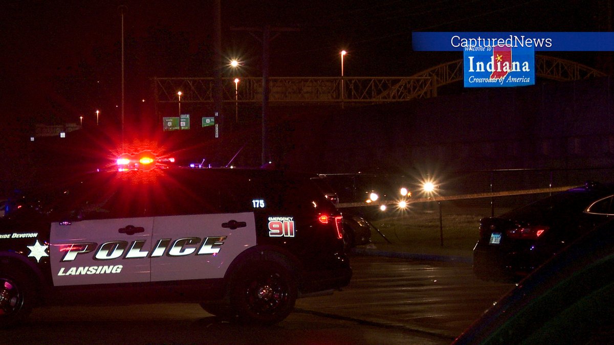 Lansing, IL Police investigating a shooting in the 3700 block of 174TH CT Wednesday evening. Large area of courtyard and parking lot covered with crime scene tape.