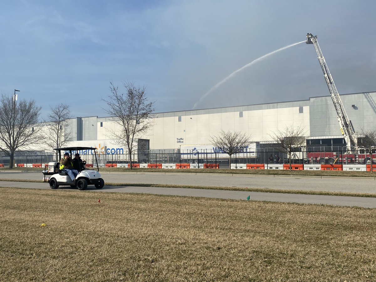 Nearly 24 hours after the call came in, firefighters are still working to put out the fire at the Walmart distribution center in Plainfield. The smell of smoke is heavy in the air as crews work