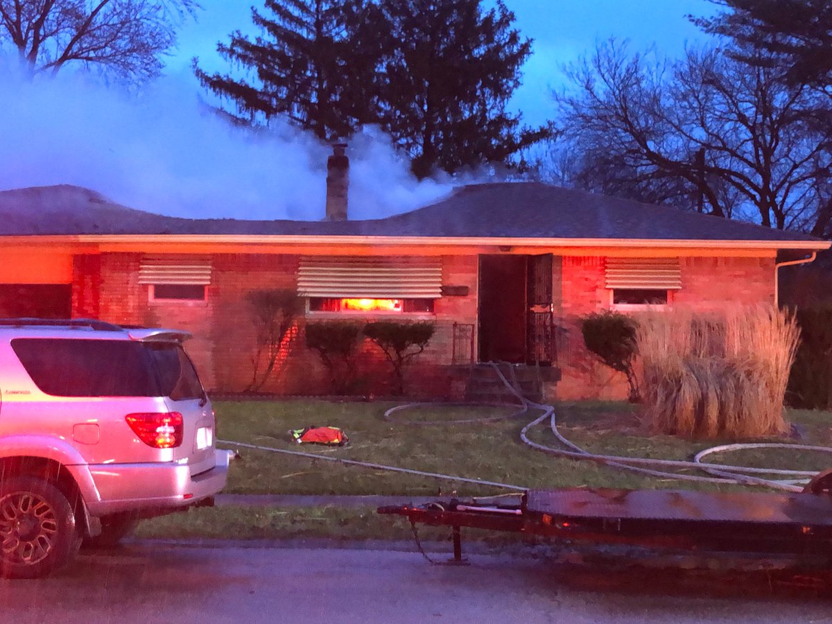 Firefighters from IFD & from Lawrence are working to put out the flames in this burning home on Irwin Ave, near 46th &amp; Shadeland on Indy's northeast side. It looks like the roof has collapsed in the center of the home, no word yet if there are injuries