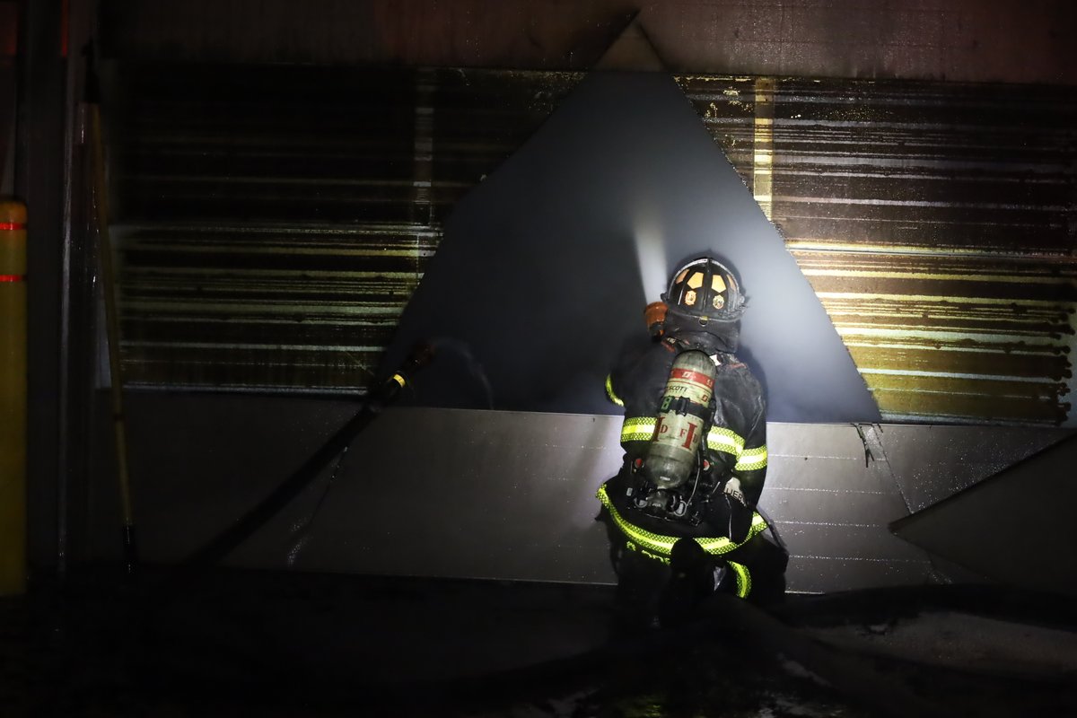 11:10 PM IFD FF's assisted by @Lawrence_FD arrived at 8126 Castleton to find a 9600 square foot building with  heavy smoke pushing from all 4 sides.  Despite efforts to initiate an aggressive offensive attack command ordered defensive attack only. 