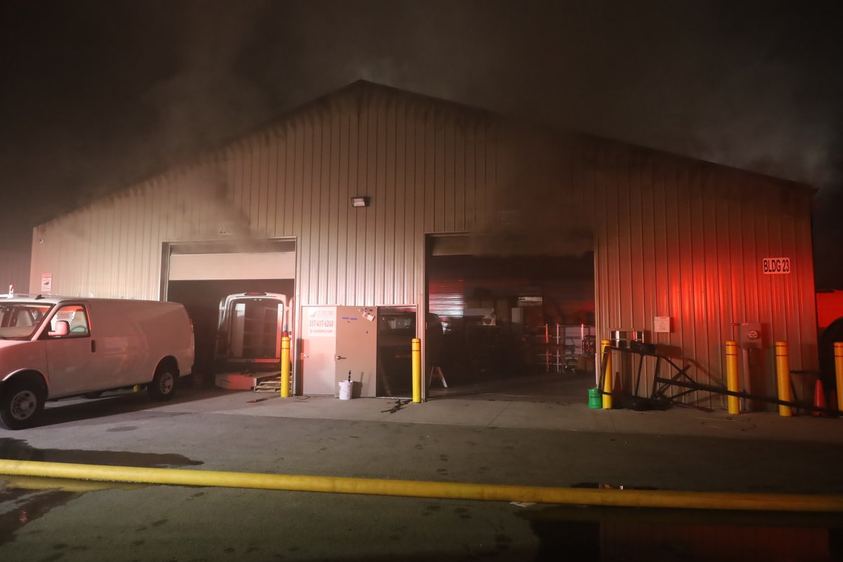11:10 PM IFD FF's assisted by @Lawrence_FD arrived at 8126 Castleton to find a 9600 square foot building with  heavy smoke pushing from all 4 sides.  Despite efforts to initiate an aggressive offensive attack command ordered defensive attack only. 