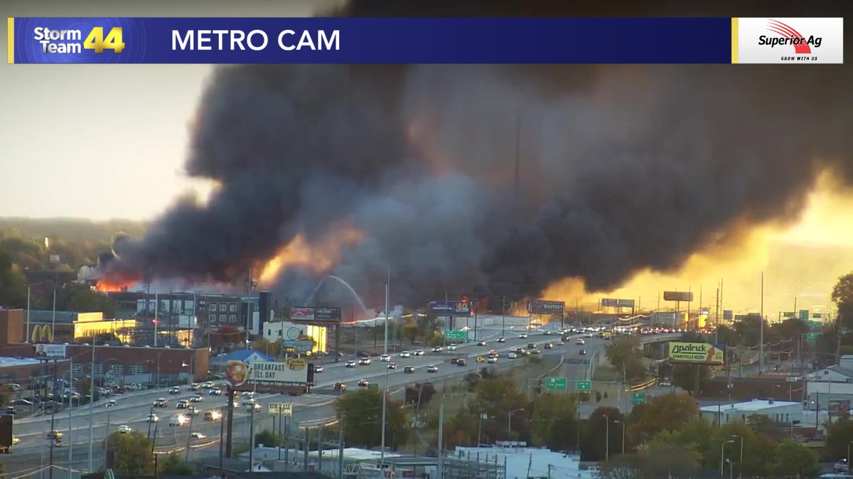 Massive fire at Morton's Warehouse in Evansville. Walls in the building have started collapsing and the fire has spread to surrounding buildings. Winds are moving at about 8 MPH out of the northwest, just another challenge