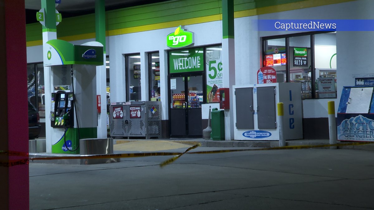 EAST CHICAGO, IN: Coroner on scene at a BP gas station near 145TH & Indianapolis Blvd Sunday evening. Crime scene tape stretched around the business.  