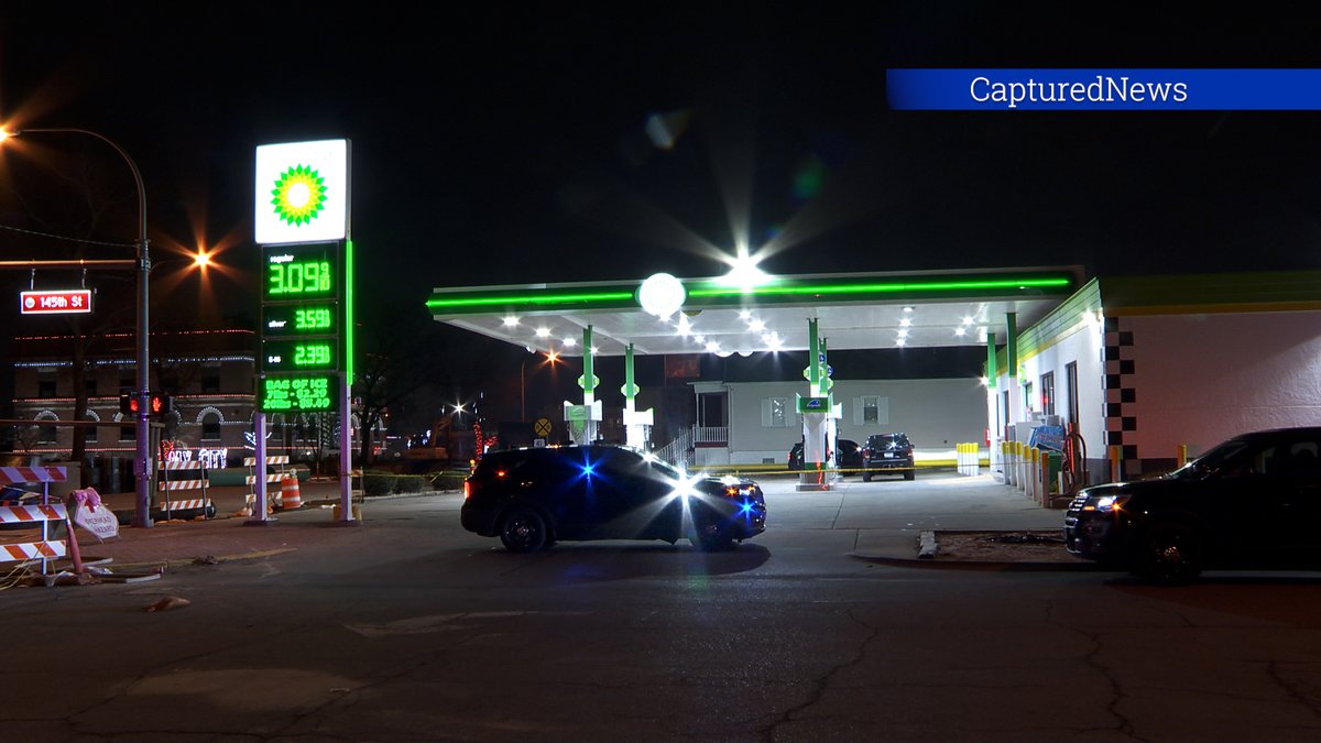 EAST CHICAGO, IN: Coroner on scene at a BP gas station near 145TH & Indianapolis Blvd Sunday evening. Crime scene tape stretched around the business.  