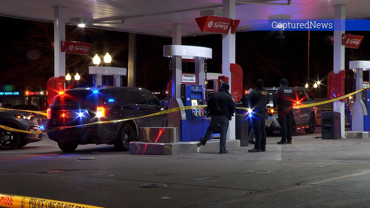 MUNSTER, IN: Police are investigating a shooting at a gas station near Ridge & Manor. Crime scene tape is stretched around the station. Police have an SUV boxed in. 