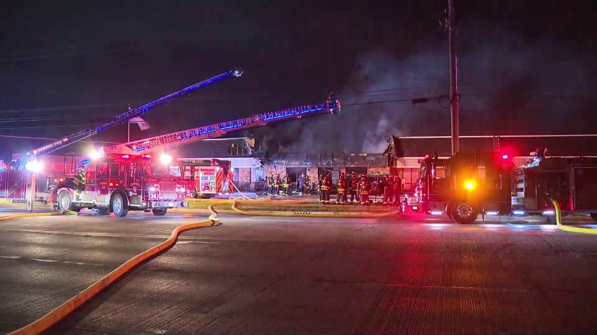 Crews are battling a fire that's caused extensive damage at a strip mall near North Michigan Road and West 96th Street in Carmel. At least one injury has been reported. Both directions of Michigan Road are closed in the area 