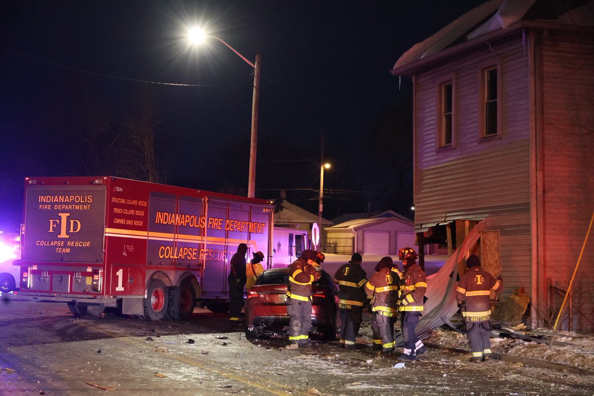 IMPD is investigating after a two-car crash overnight near North Belmont Avenue and West 10th Street sent one of the cars completely through a vacant building. 