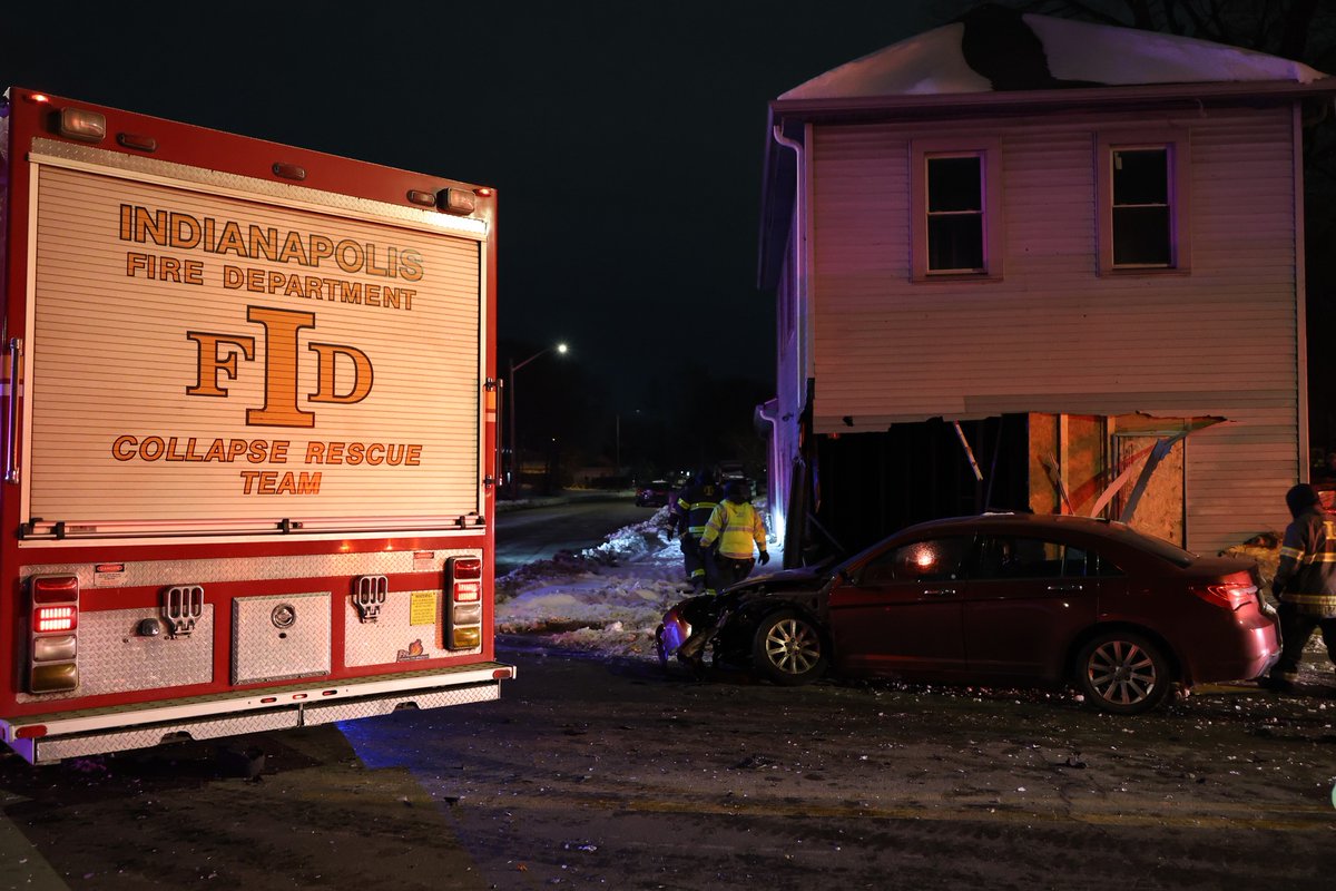 IMPD is investigating after a two-car crash overnight near North Belmont Avenue and West 10th Street sent one of the cars completely through a vacant building. 