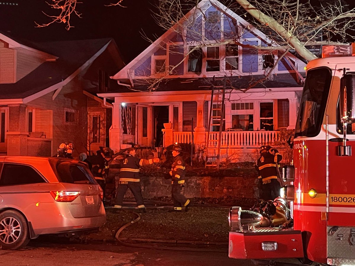 IFD crews are investigating after they saved a woman and man from the roof of a house fire on Indy's near south side this morning