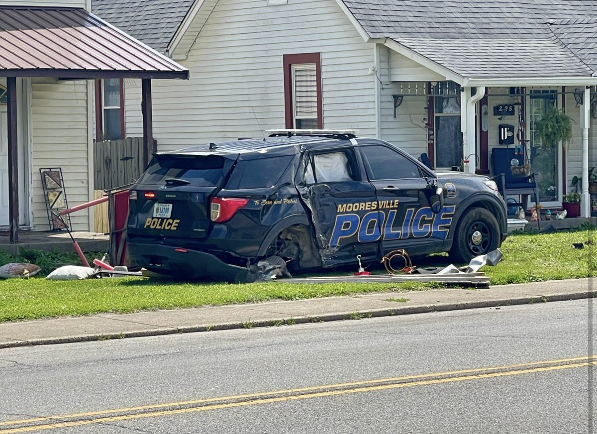 Mooresville Police tell us the officer was headed to a domestic violence call when she crashed. The officer was conscious and alert, and taken to the hospital. The male involved in the domestic was subdued and transported to the Morgan County Jail on several  charges including kicking the back window out of a patrol car.